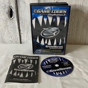 Game Codes for PlayStation 2 - Black and Blue game shark vintage ps2 retro game
